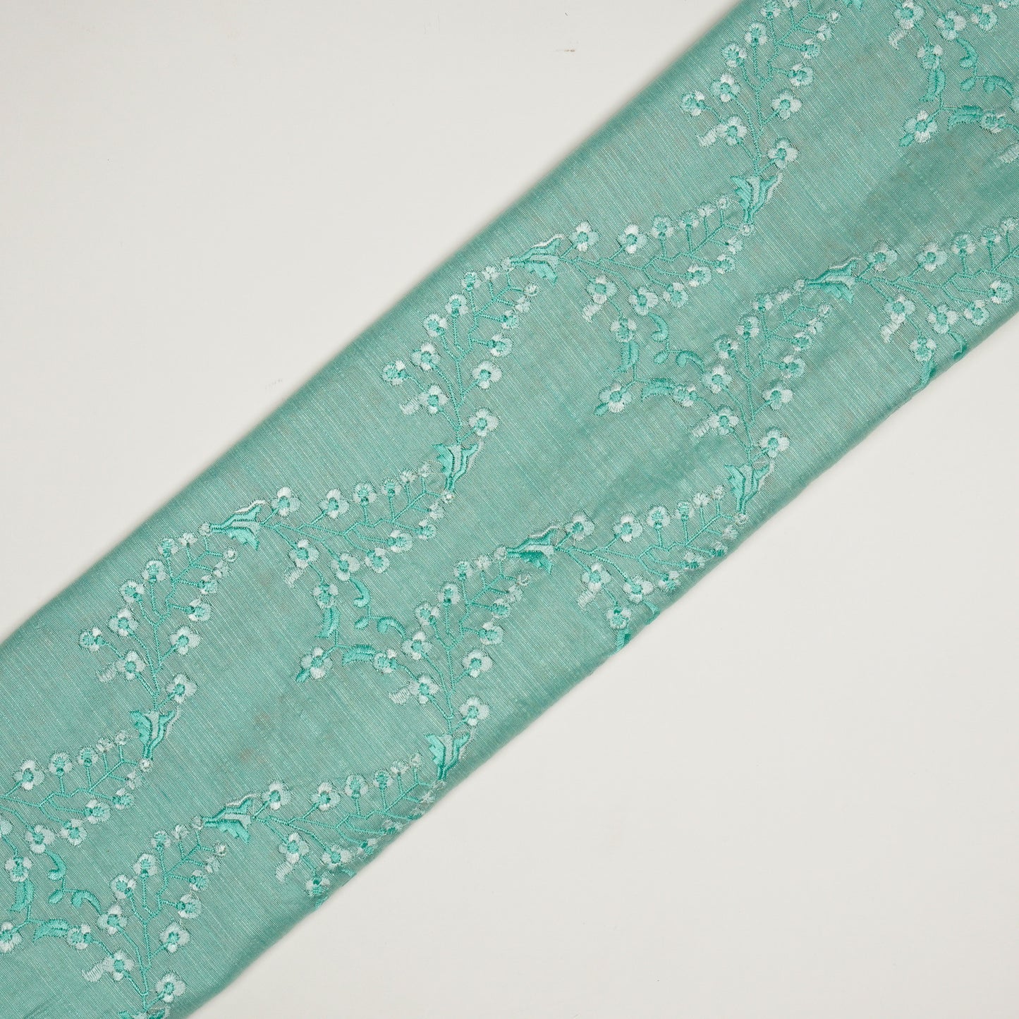 Parkha Turquoise Viscose Raw Silk Embroidered Fabric in Jaal Pattern