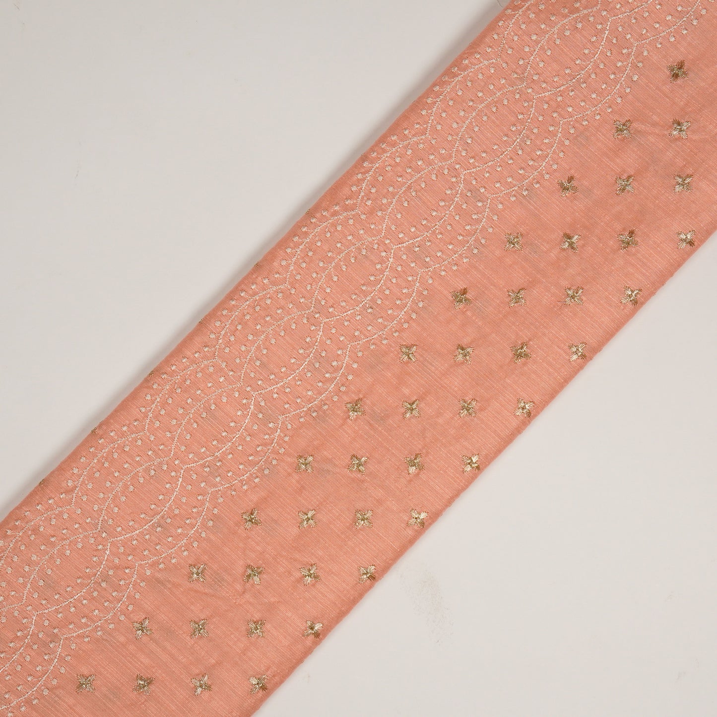 Naira Peach Viscose Raw Silk Embroidered Fabric in Jaal Pattern