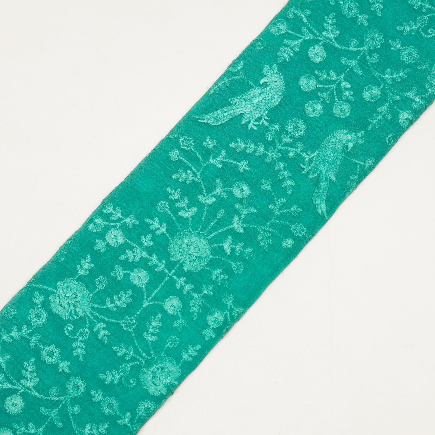 Hasna Teal Viscose Raw Silk Embroidered Fabric in Jaal Pattern