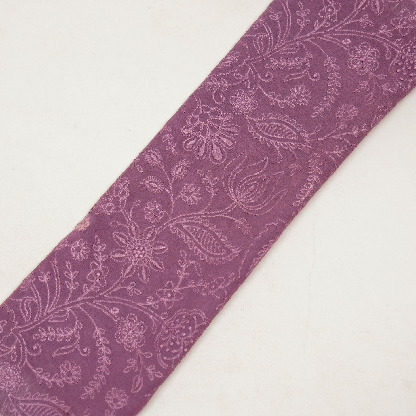 Tiesha Deep Mauve Viscose Raw Silk Embroidered Fabric in Jaal Pattern