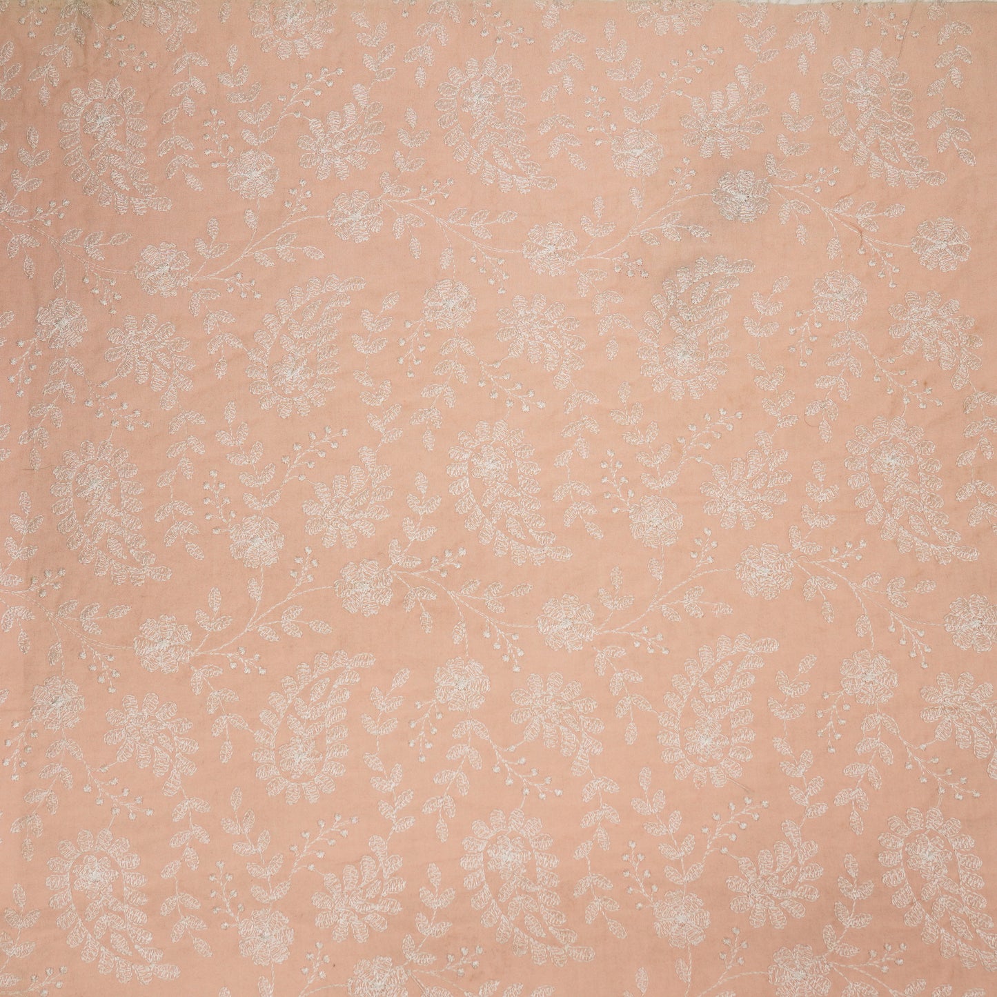 Daania Peach Cotton Embroidered Fabric in Jaal Pattern