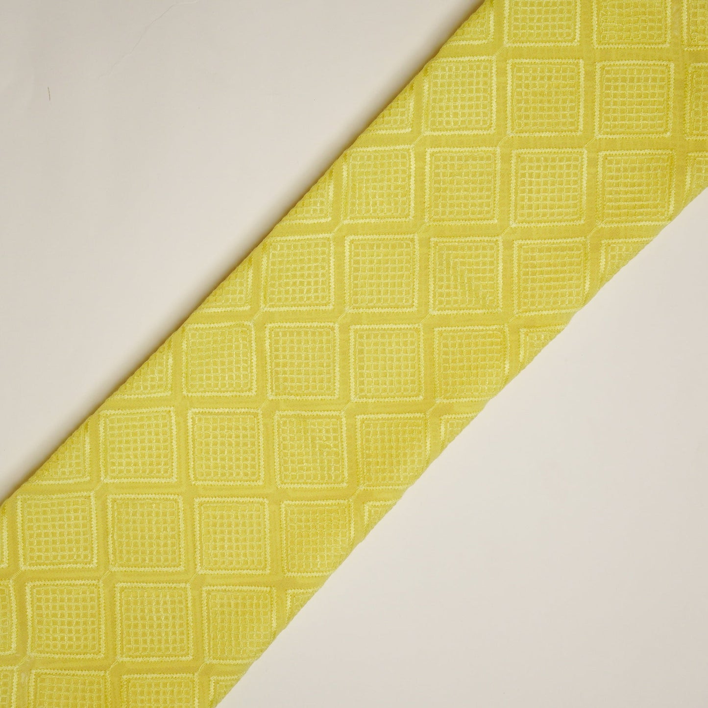 Shaheen Yellow Viscose Georgette Embroidered Fabric in Geometric Jaal Pattern