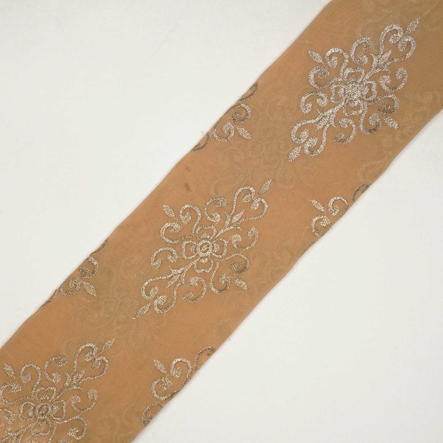 Urwi Peach Viscose Georgette Embroidered Fabric in Buta