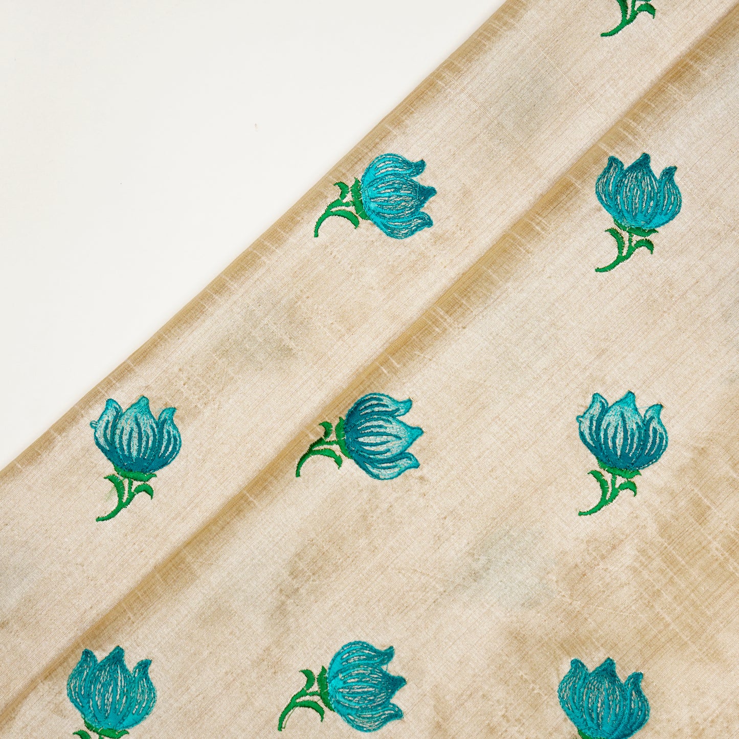 Naim Natural/Aqua Viscose Raw Silk Embroidered Fabric in Buta Pattern