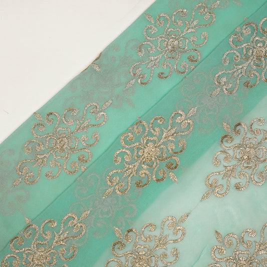 Urwi Turquoise Viscose Georgette Embroidered Fabric in Buta