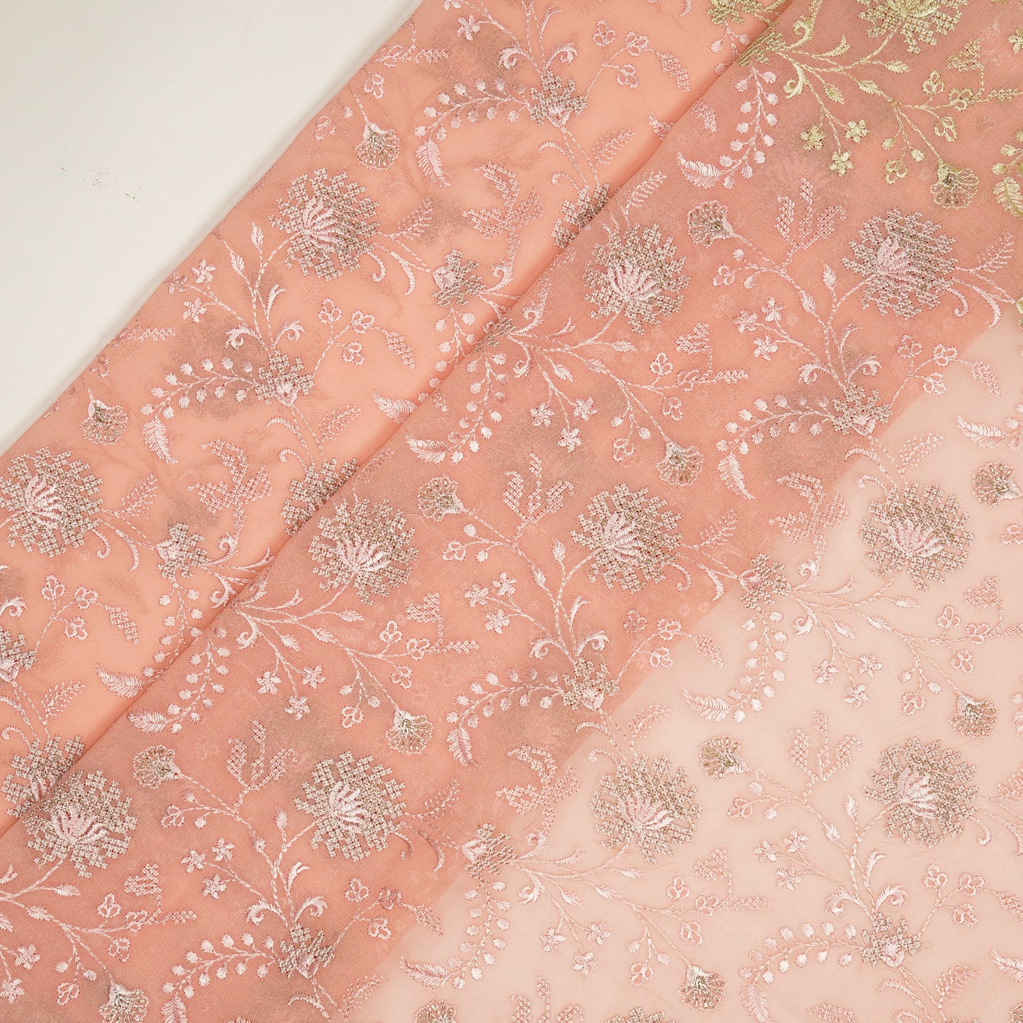 Reyah Peach Viscose Georgette Embroidered Fabric in Jaal Pattern