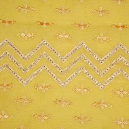 Umi Gold Viscose Raw Silk Embroidered Fabric in Jaal Pattern