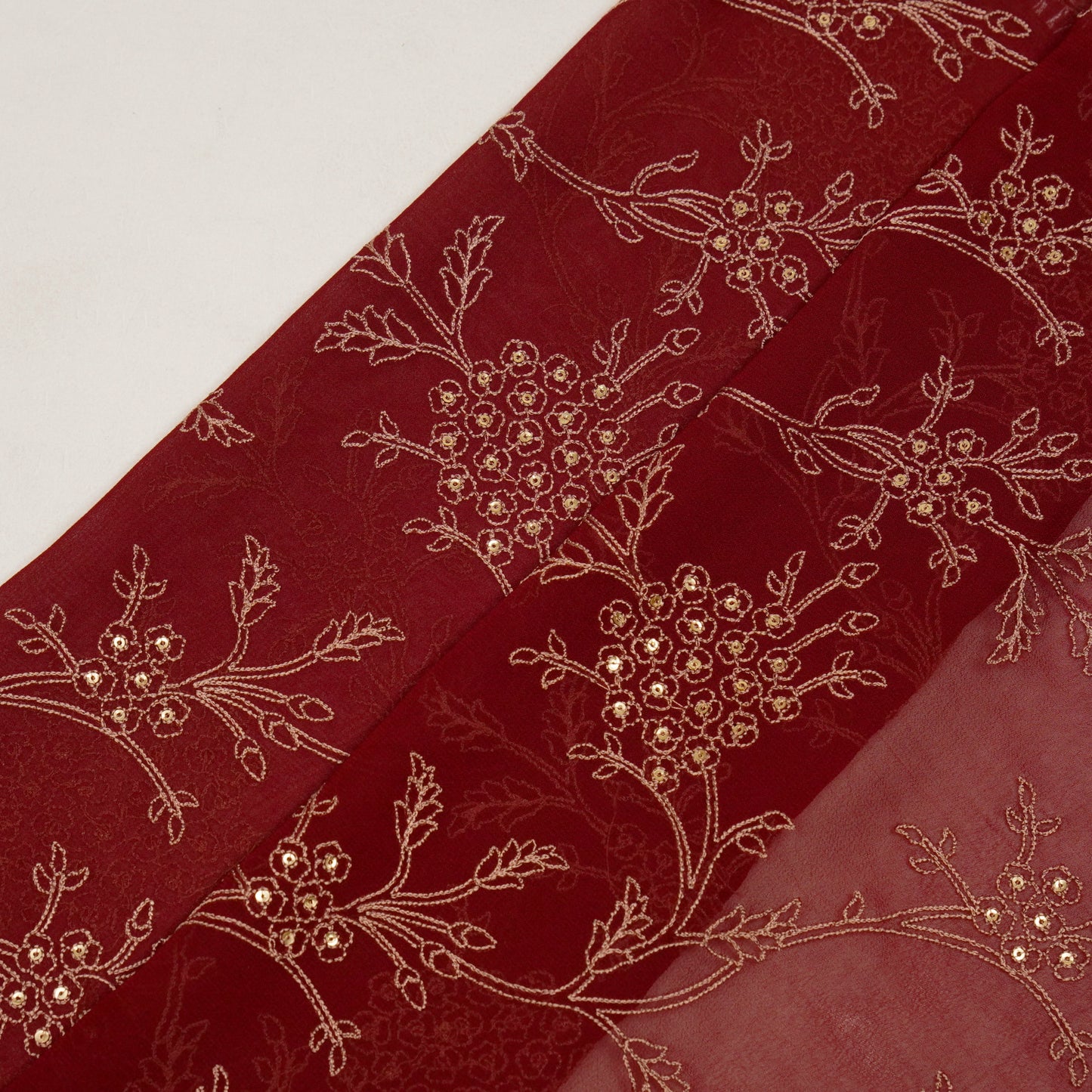 Shida Maroon Viscose Georgette Embroidered Fabric in Jaal Pattern