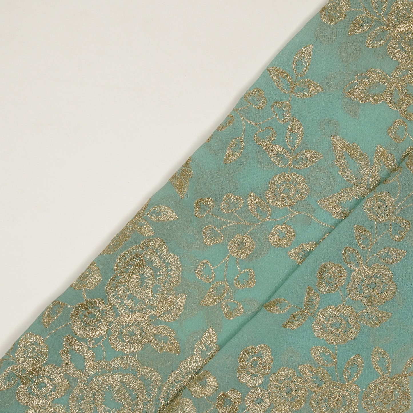 Mahnoor Turquoise Viscose Georgette Embroidered Fabric in Jaal Pattern