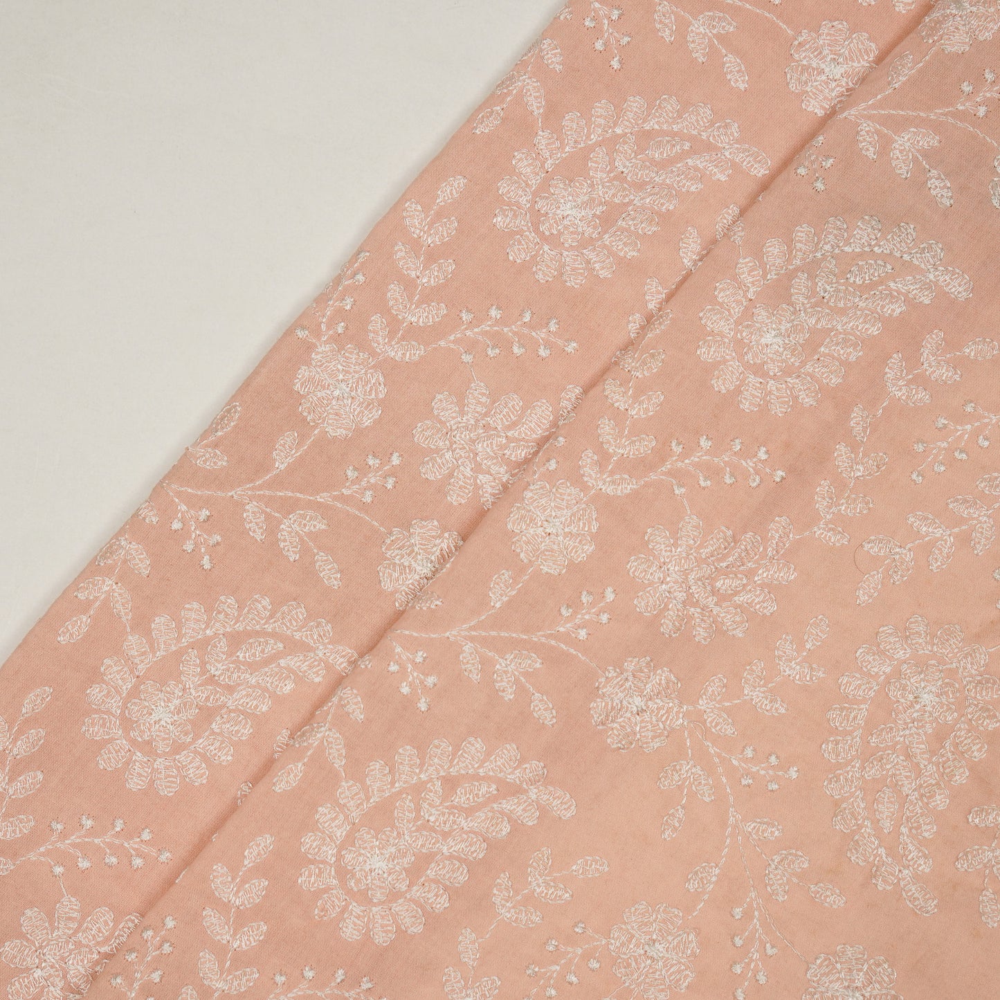 Daania Peach Cotton Embroidered Fabric in Jaal Pattern