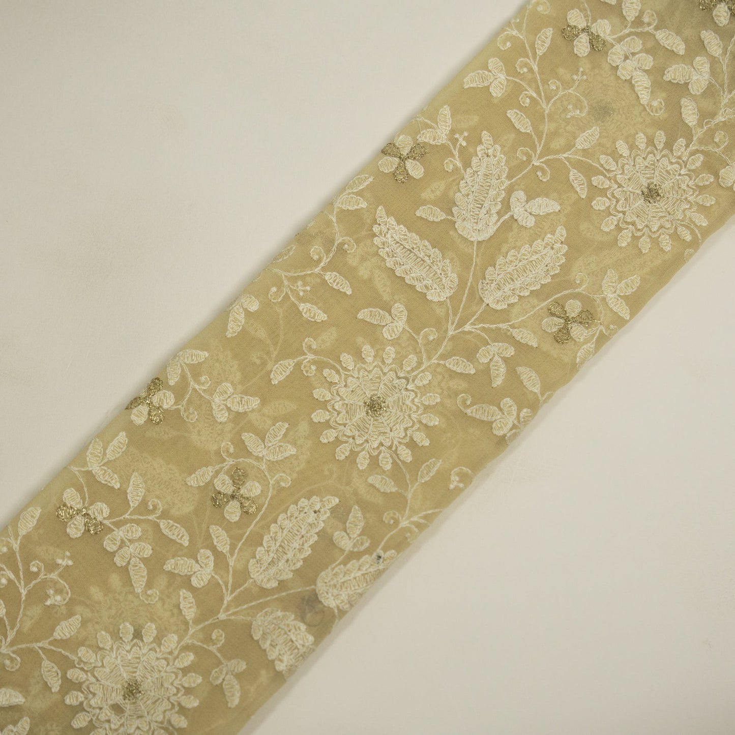 Muminah Cream Viscose Georgette Embroidered Fabric in Jaal Pattern