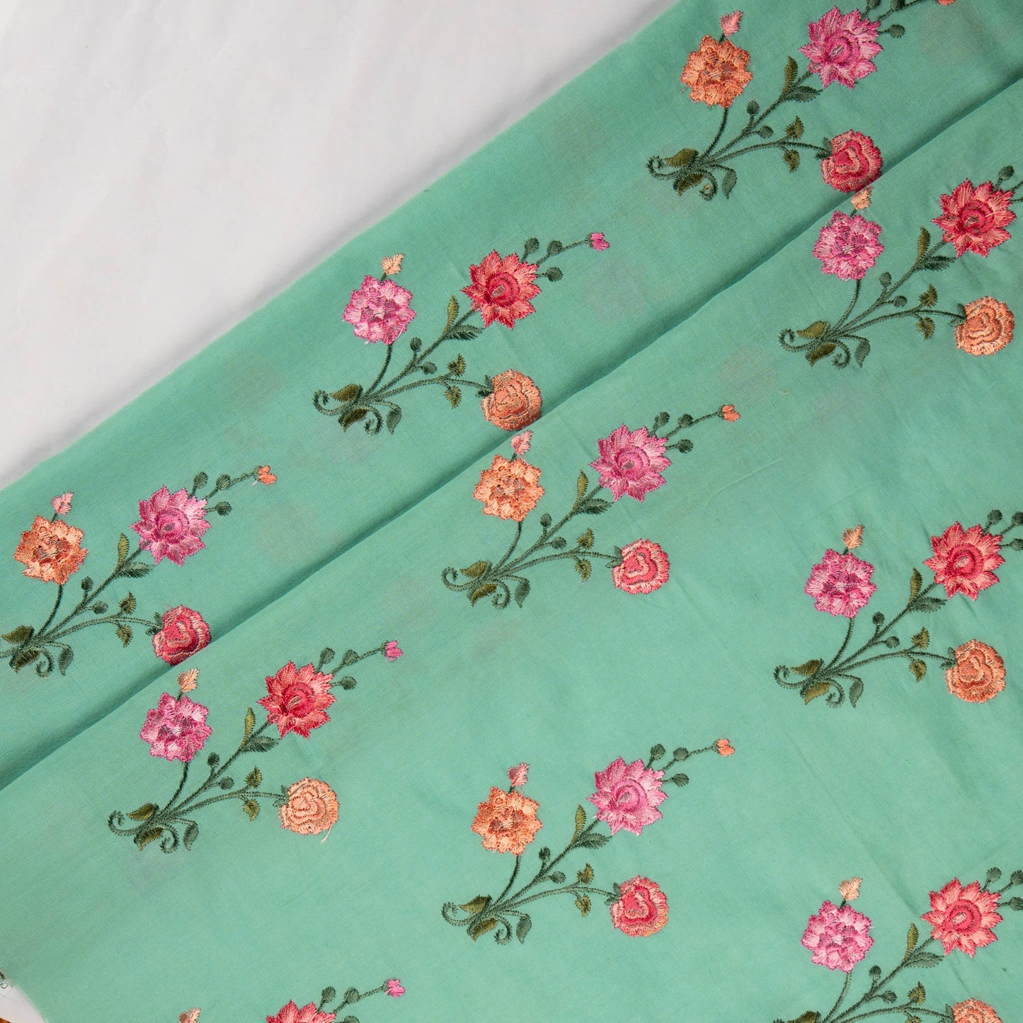 Hemangini Turquoise Cotton Embroidered Fabric in Buta Pattern