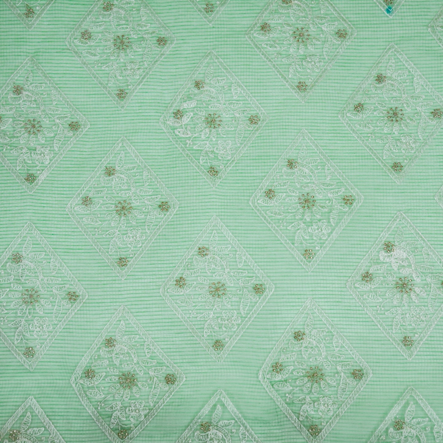 Yara Pista Green Semi Munga Kota Embroidered Fabric in Buta Pattern