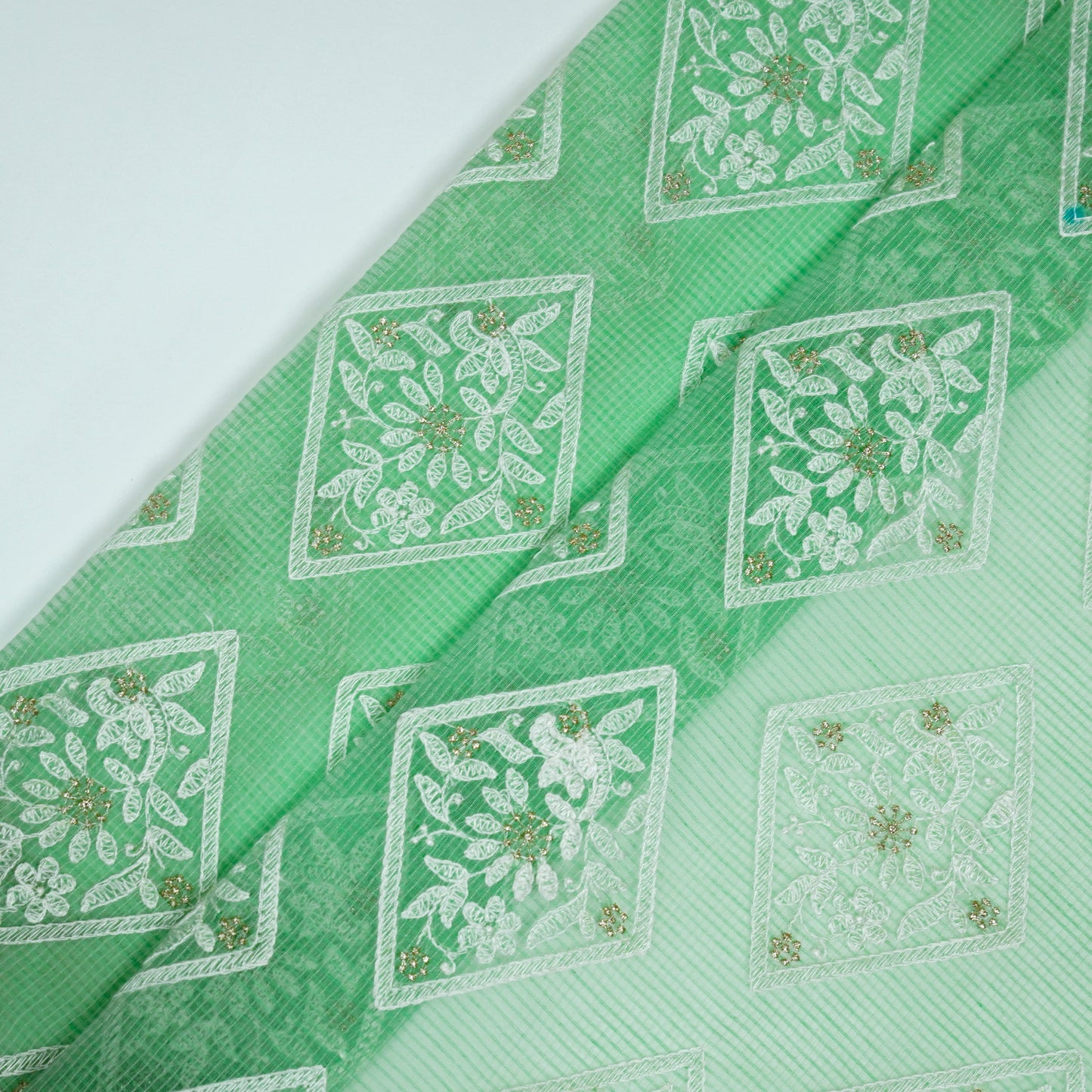 Yara Pista Green Semi Munga Kota Embroidered Fabric in Buta Pattern