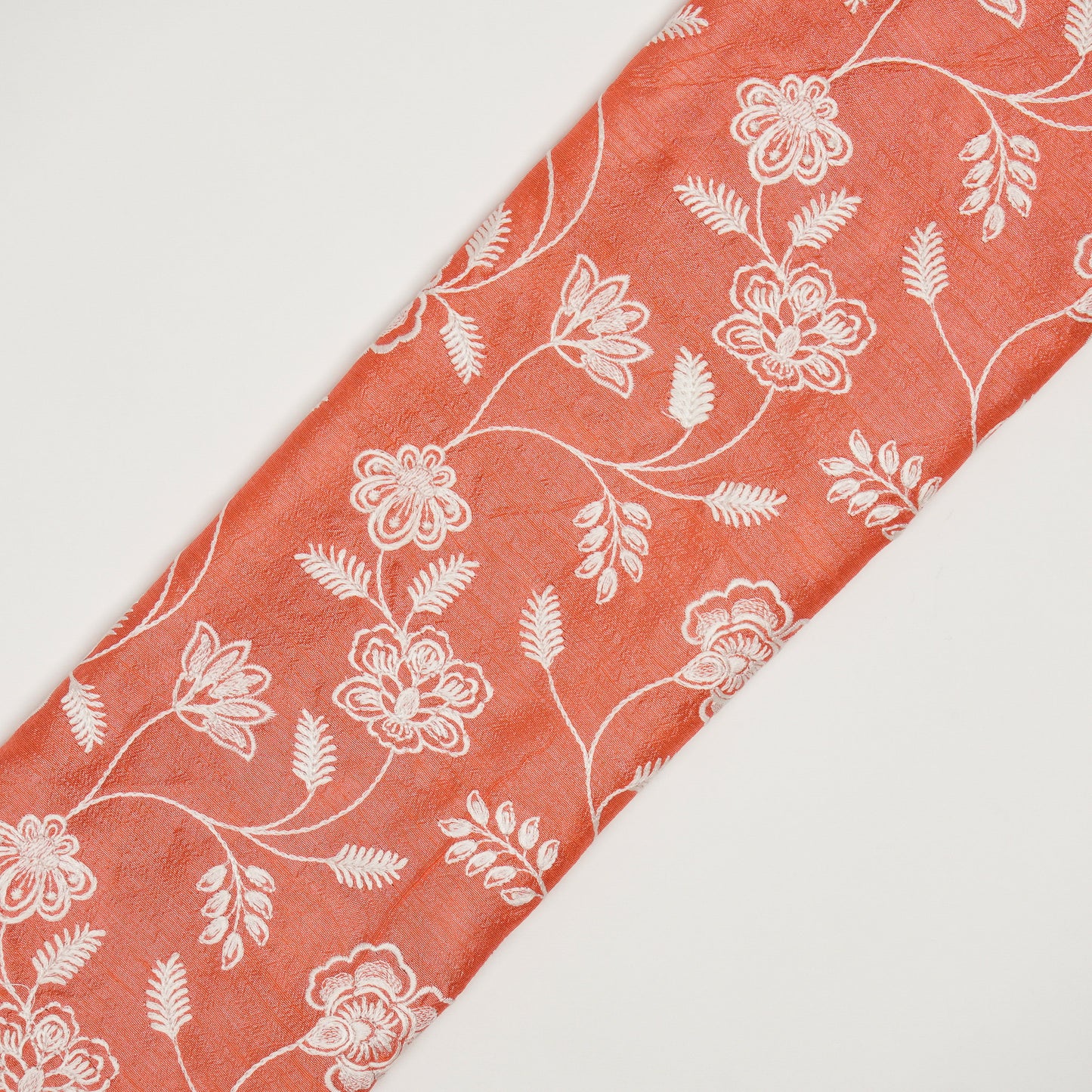 Prisha Deep Peach Viscose Raw Silk Embroidered Fabric in Jaal Pattern